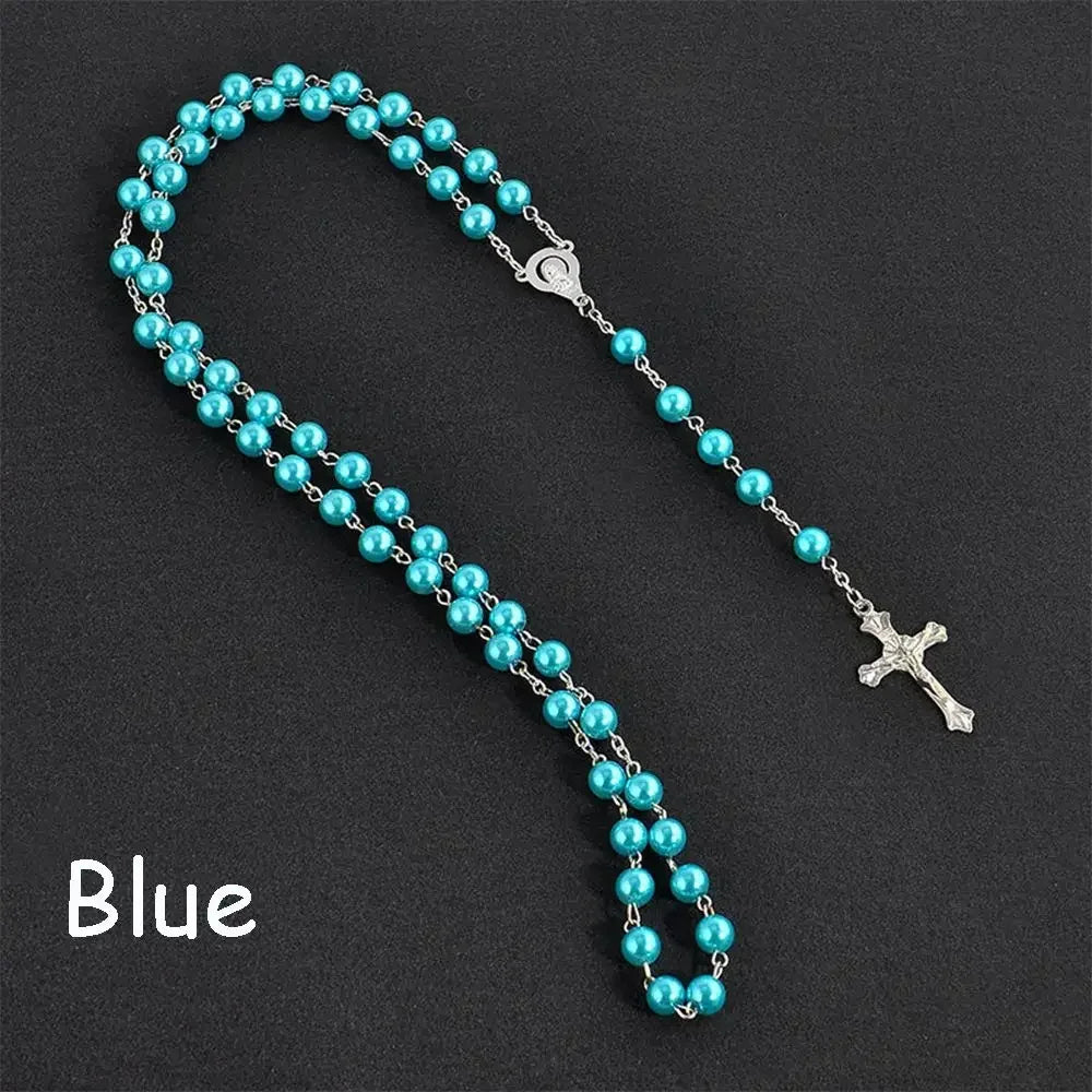 Blue beaded rosary necklace with a silver cross pendant