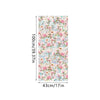 Botanical print static cling window film featuring pink and white floral branches on a light background