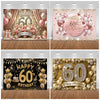 A photo booth backdrop featuring balloons, glitter, and gold accents for a 60th birthday celebration.