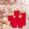 Red cylinder stands used as elastic covers for party and event decor with balloons and streamers
