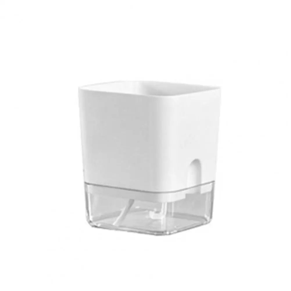 A white self-watering planter with a clear reservoir visible from the top.