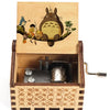 Hand-cranked wooden music box featuring a Totoro design illustration on the lid.