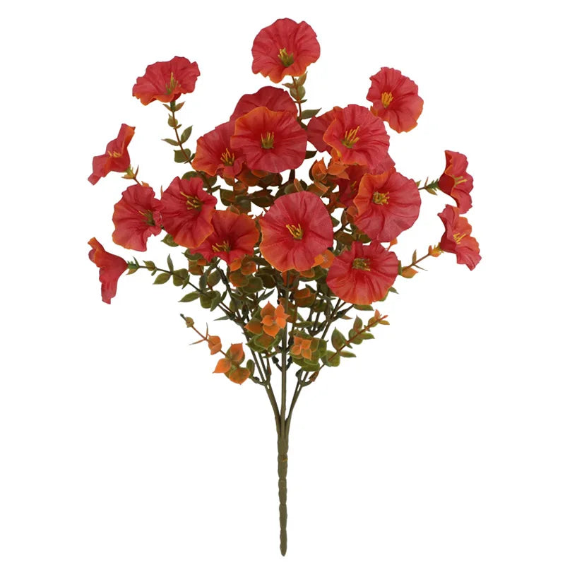 A spray of vibrant artificial pansy flowers in shades of reddish-orange and deep coral.