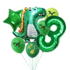 A green inflatable dinosaur balloon shaped like the number 3, surrounded by other green and yellow dinosaur-themed balloons.