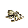 Antique brass octopus desk ornament with detailed texture