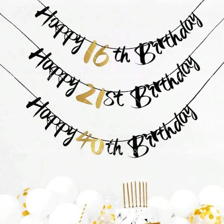 Elegant black and gold glitter birthday banner with happy birthday text strung across the frame