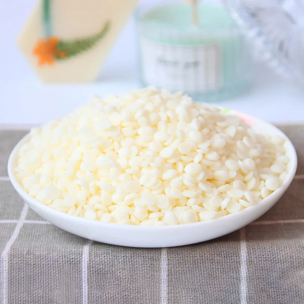 A bowl filled with white natural soy wax flakes for DIY candle making