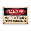 Vintage metal tin sign with a red oval saying DANGER and text below that reads Mouth Operates Faster Than Brain