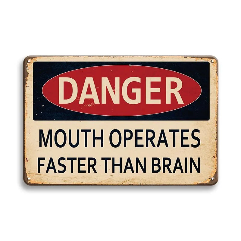 Vintage metal tin sign with a red oval saying DANGER and text below that reads Mouth Operates Faster Than Brain