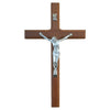 Hand-carved wooden cross wall decor with a silver figure mounted on a brown wooden cross.