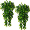 Two bunches of artificial eucalyptus leaves used for home decor