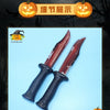 A realistic bloody knife prop with a dark handle and blade displayed against a light blue background.