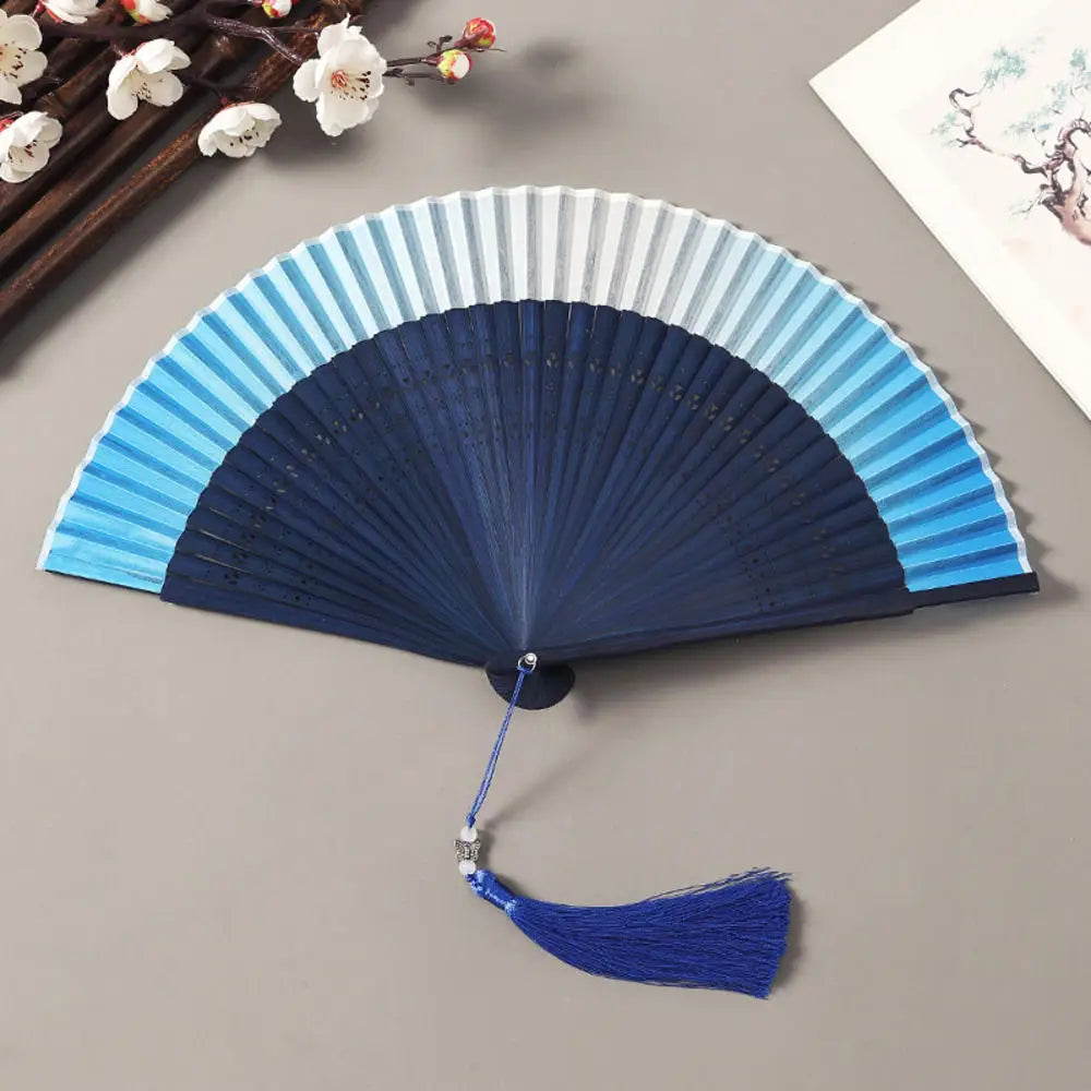 Traditional Bamboo Folding Fan with Solid Color Design
