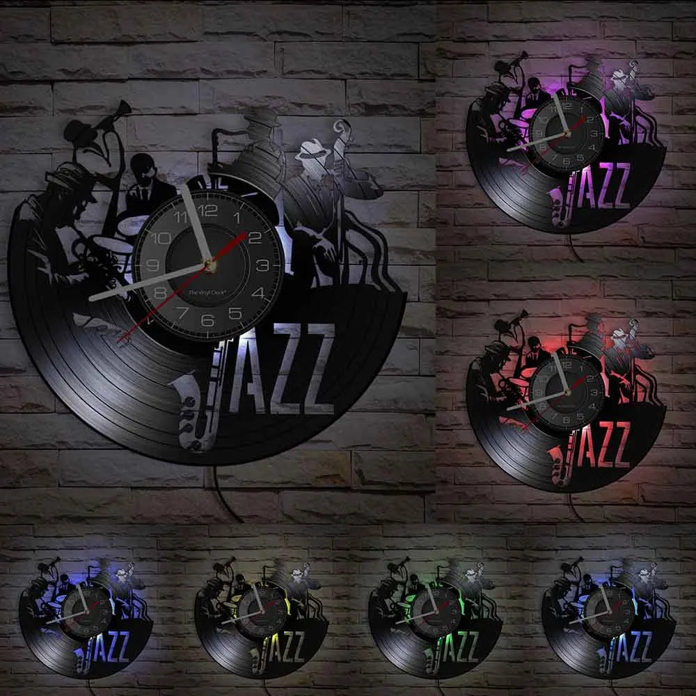 A vintage vinyl record wall clock featuring a black disc design and the word JAZZ on a brick background.