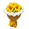 Handmade crochet flower bouquet keychain featuring yellow and green flowers with white frosting and brown yarn stem