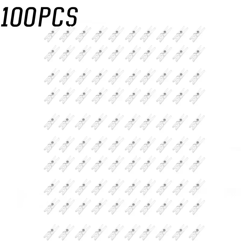 A grid showing 100 mini clear plastic spring clips for photos, papers, and crafts.