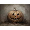 A carved pumpkin face with a menacing grin is featured on a dark, moody canvas print.