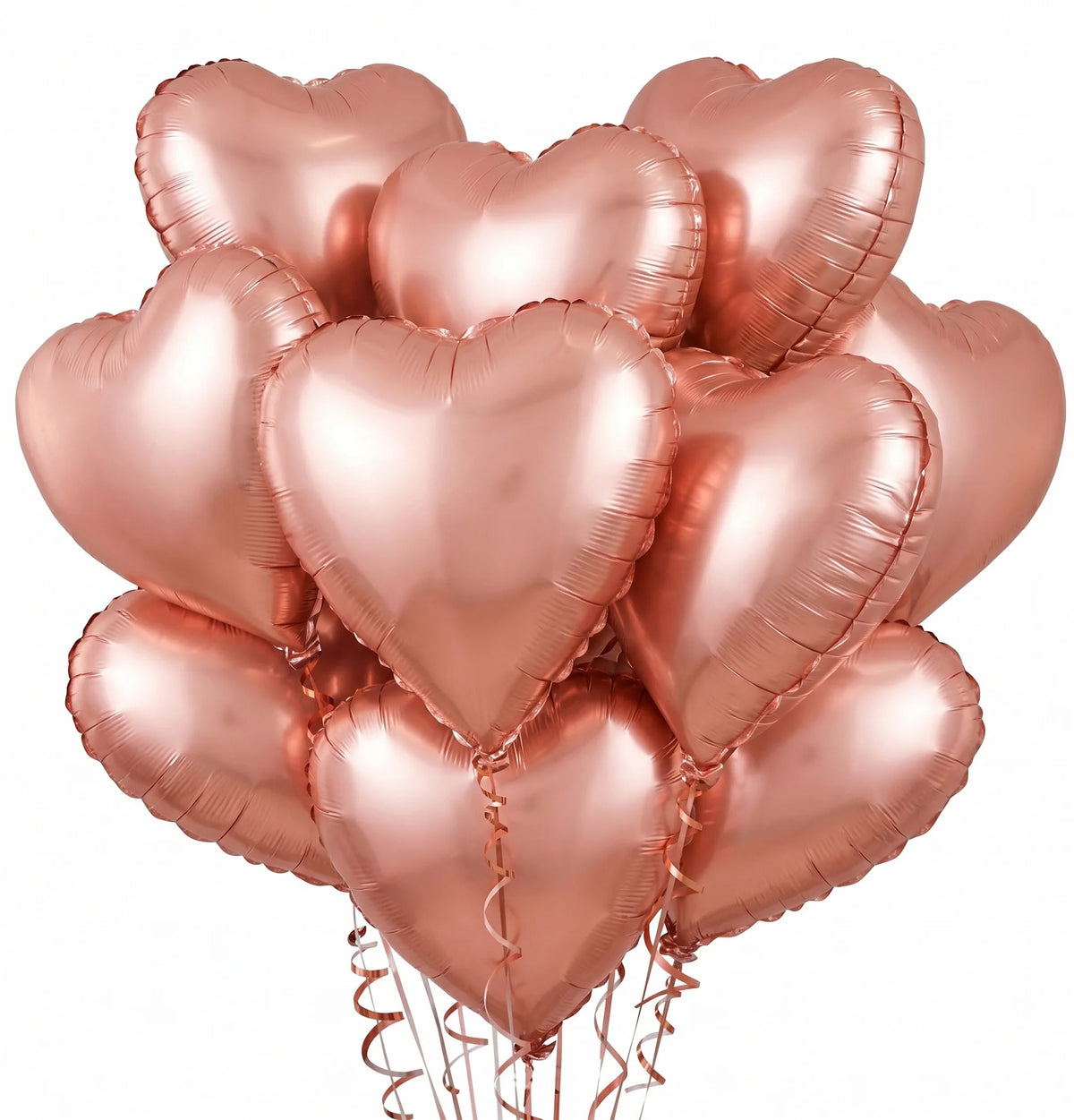 A bunch of pink heart-shaped foil balloons tied together for a celebration.