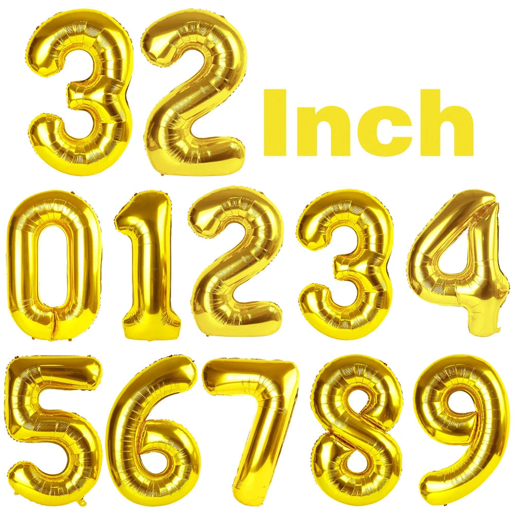A set of gold foil number balloons spelling out thirty-two inches.