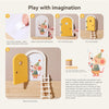 A set of wooden fairy elf door miniatures and a ladder for imaginative play