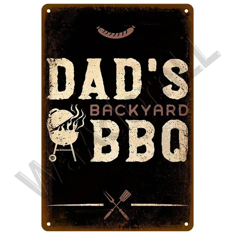 A distressed metal sign with the text Dad's Backyard BBQ on it, featuring a grill icon and crossed utensils.