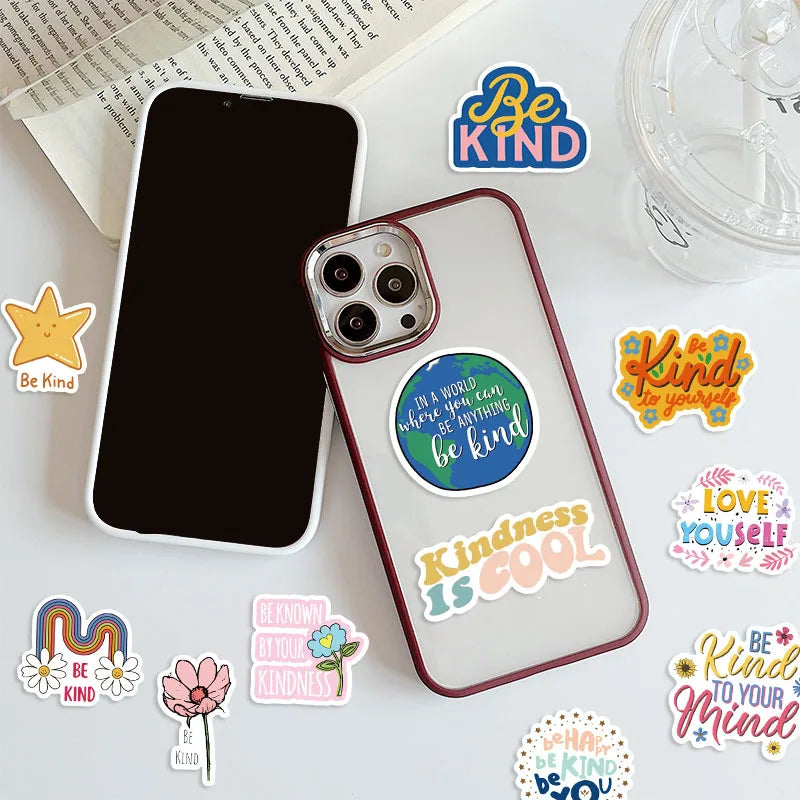 An inspirational sticker pack featuring various designs like Be Kind and Kindness is Cool on a clear vinyl sheet.