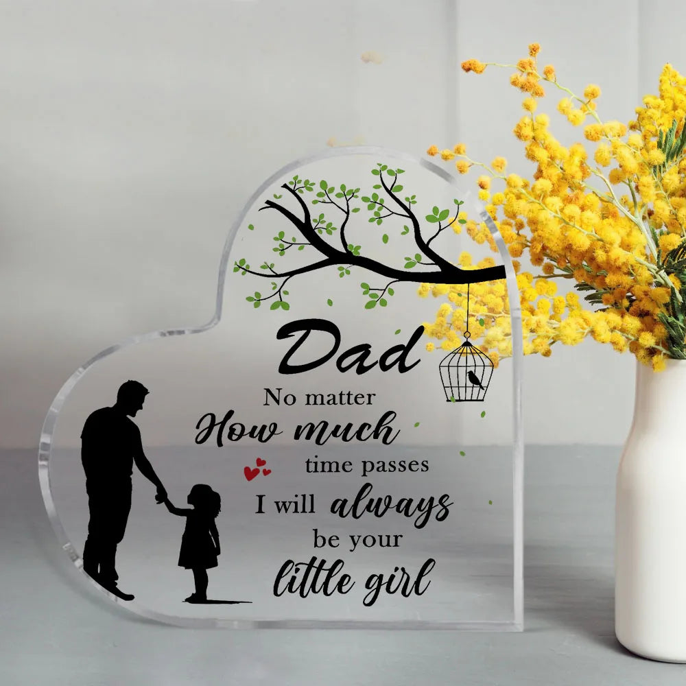 A clear acrylic heart-shaped plaque engraved with the text Dad No matter how much time passes I will always be your little gi