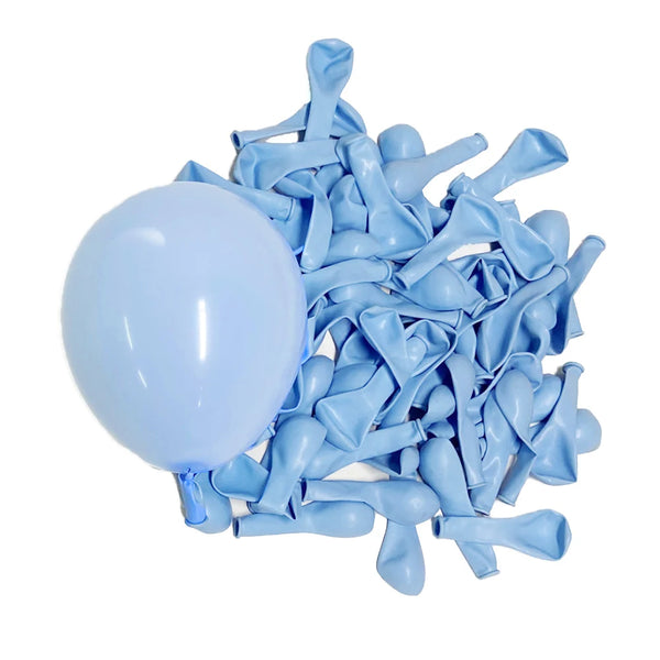 A pile of light blue latex balloons shaped like macarons for parties and celebrations.