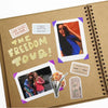 A brown scrapbook album with photos and tickets for a freedom tour theme.