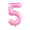 A pink foil number balloon shaped like the numeral 5.