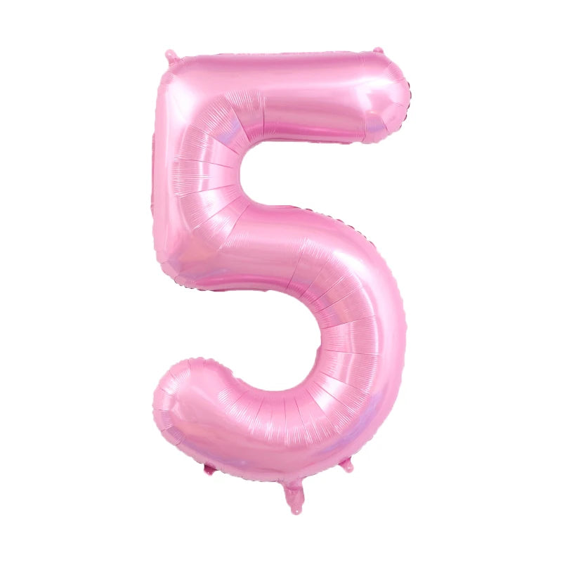 A pink foil number balloon shaped like the numeral 5.