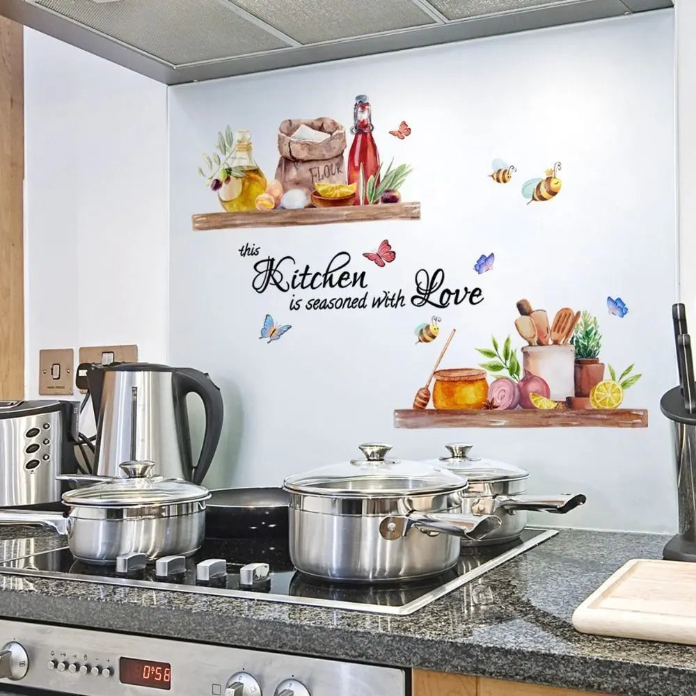 Waterproof bee butterfly wall decals displayed on a kitchen wall with appliances and wooden shelves.