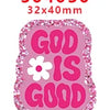 Pink glitter acrylic charm with the text GOD IS GOOD on a square background