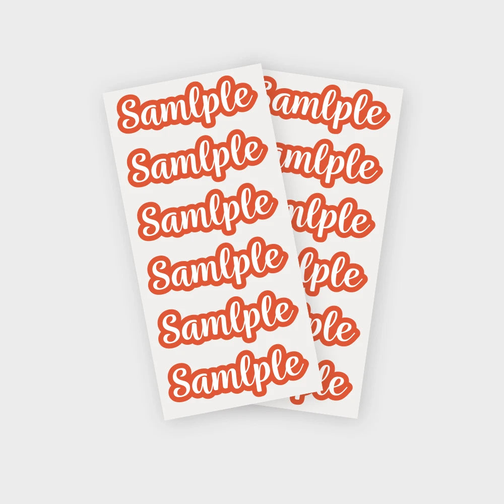 A sheet of orange-red stickers featuring the word sample multiple repeated in a playful font.