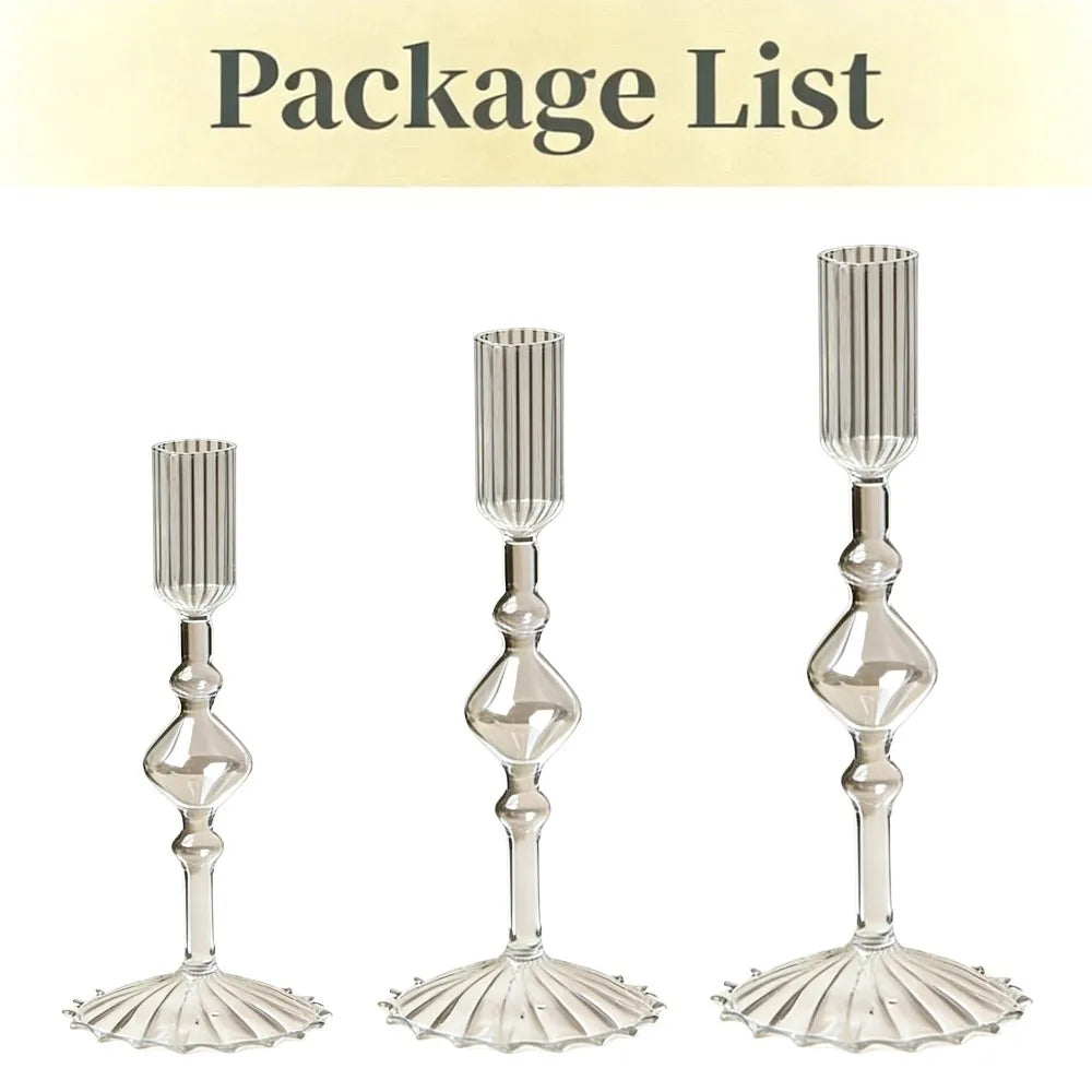 A set of three clear glass tapered candle holders with wavy textures.