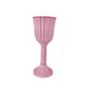 A pink, ribbed cylinder flower vase with a flared rim and a pedestal base.