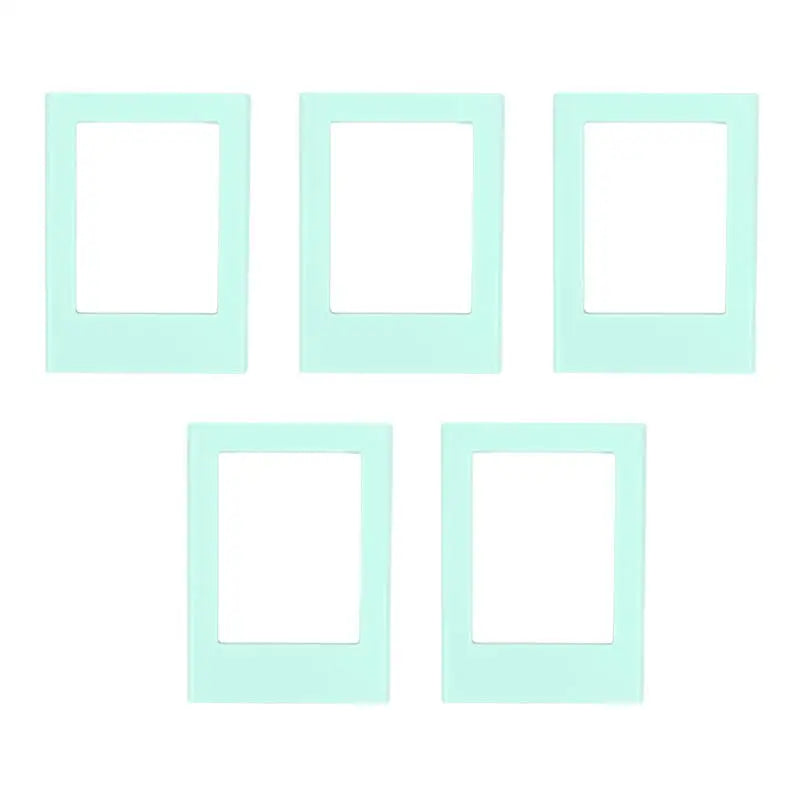 A set of five light mint green square photo frame magnets.