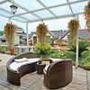Three faux eucalyptus hanging plants displayed on a wooden deck under a pergola.