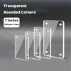 A set of seven transparent rounded corner acrylic photo frames with magnetic display stands.