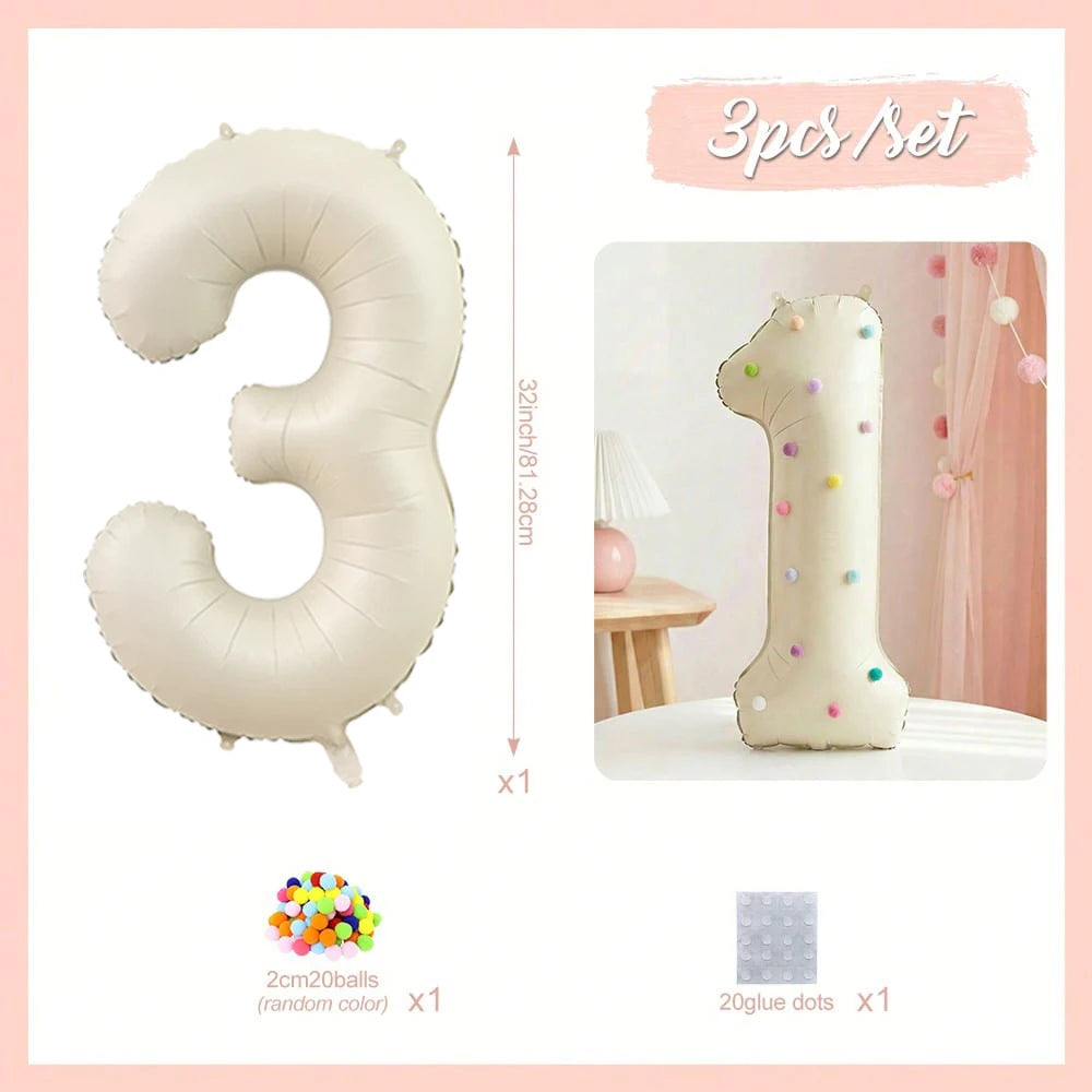 A set of three 32 inch Milky White aluminum foil number balloons, including a large number balloon and twenty glue dots.