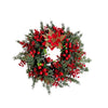 Artificial pine and eucalyptus wreath decorated with red berries and a red bow