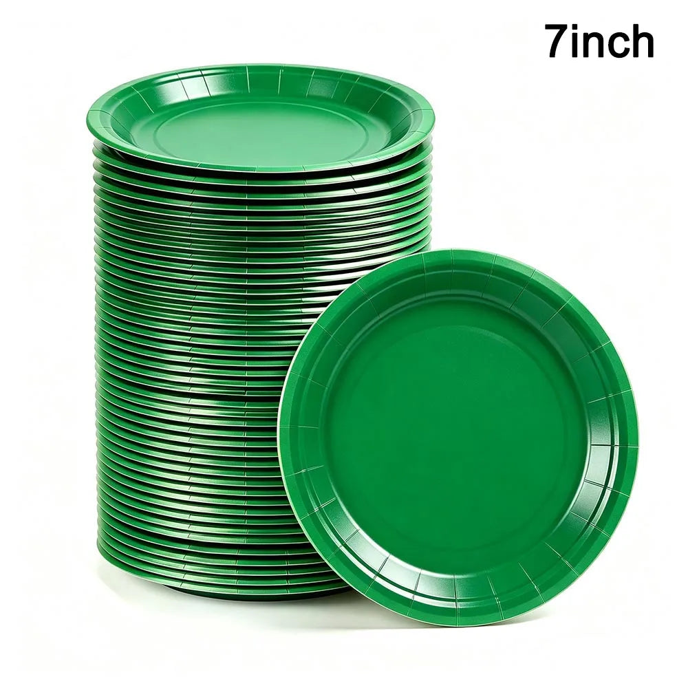 A stack of green 7-inch disposable paper plates.