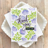 A thank you card with purple and green floral watercolor design and the text thank you with love