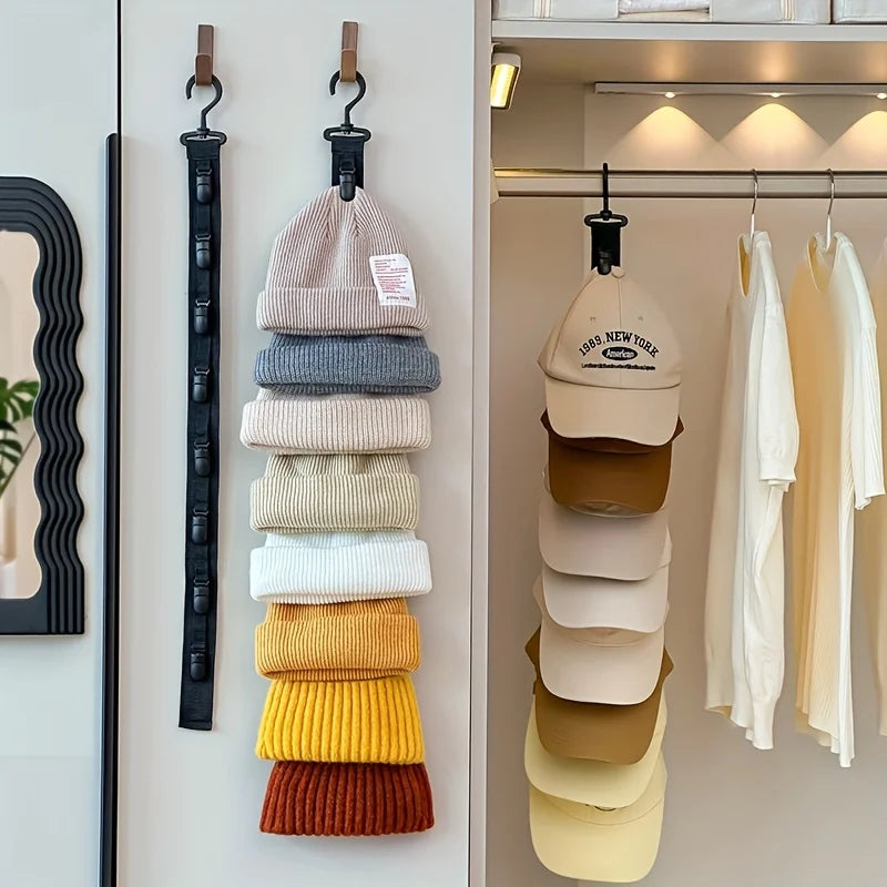 A display of various knit hats in neutral tones, including beige, gray, and mustard yellow, hanging on a closet rod.