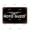 A dark metal sign featuring a white silhouette of an eagle in flight, used as vintage tin wall art.