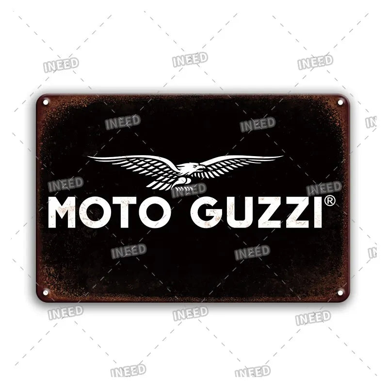 A dark metal sign featuring a white silhouette of an eagle in flight, used as vintage tin wall art.