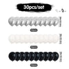 A set of black and white balloons for party decor, including silver banners.