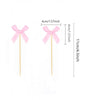 Pink bow cupcake topper set for birthday and bridal shower