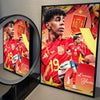 A framed print featuring a portrait of Lamine Yamal in a red football kit against a vibrant background.