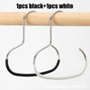 One black and one white round manganese steel hook hanging from a wooden rod.